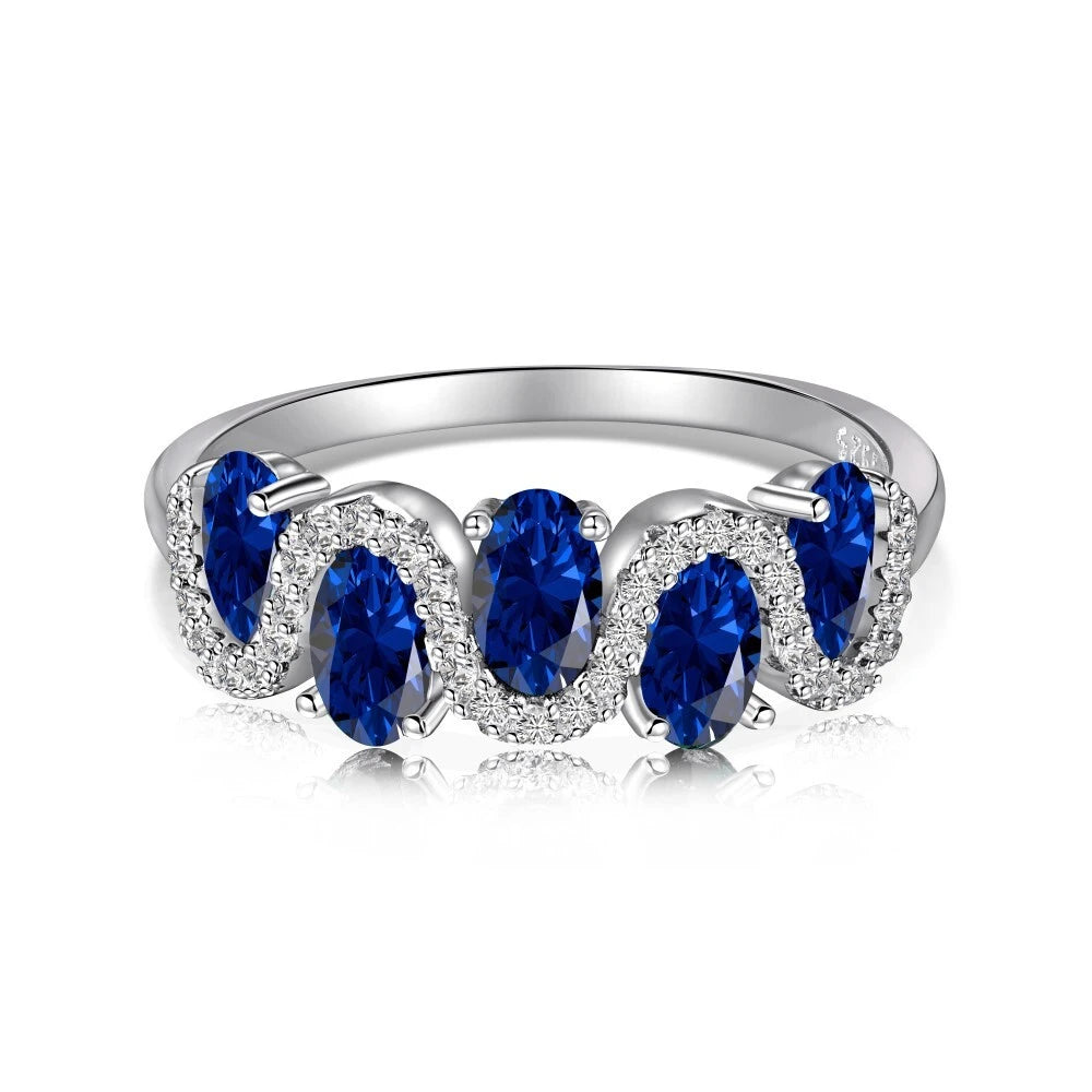 Bague "Vague Saphir Bleu" – Alliance Ondulée en Argent